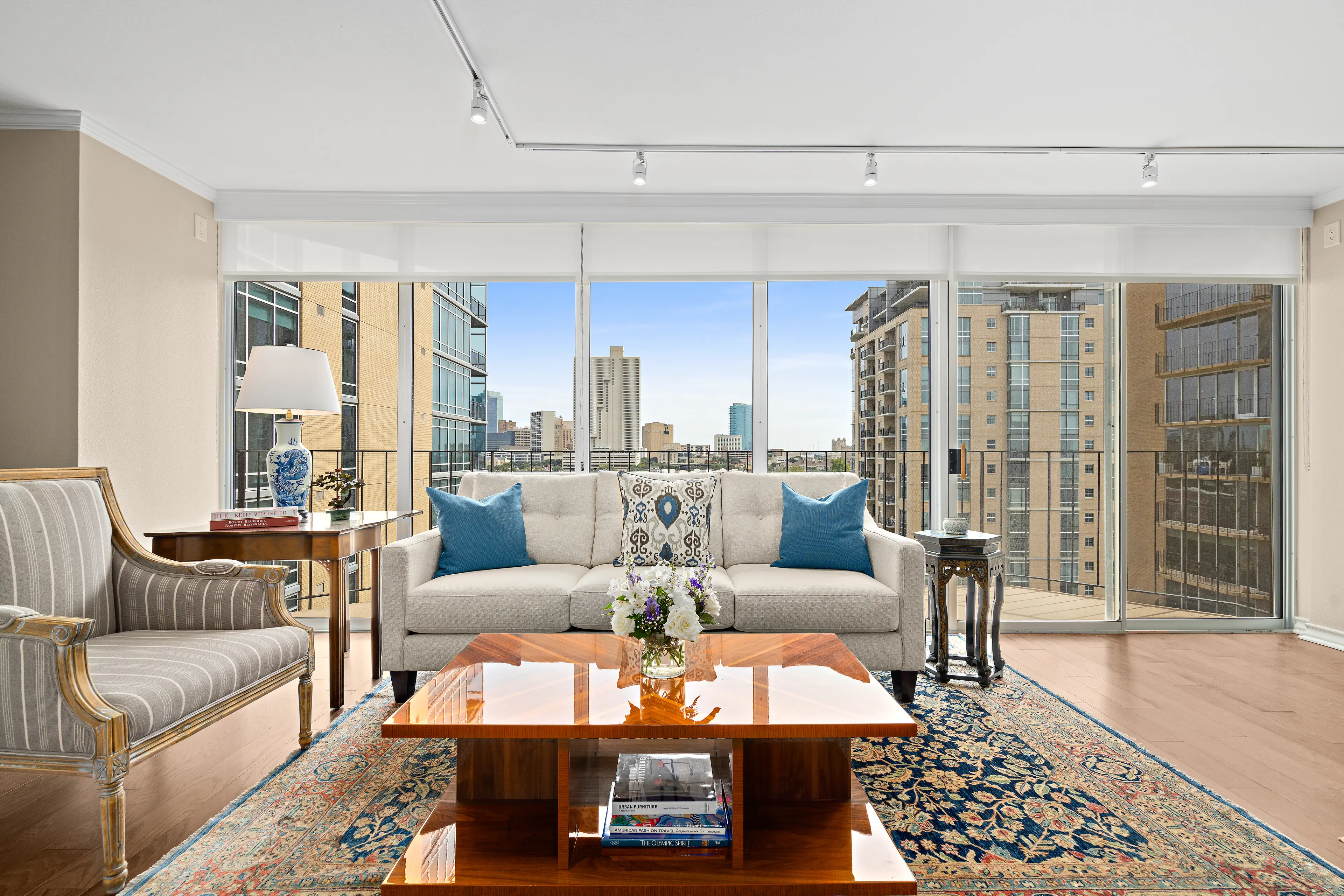 A living space with large windows at Trinity Terrace.